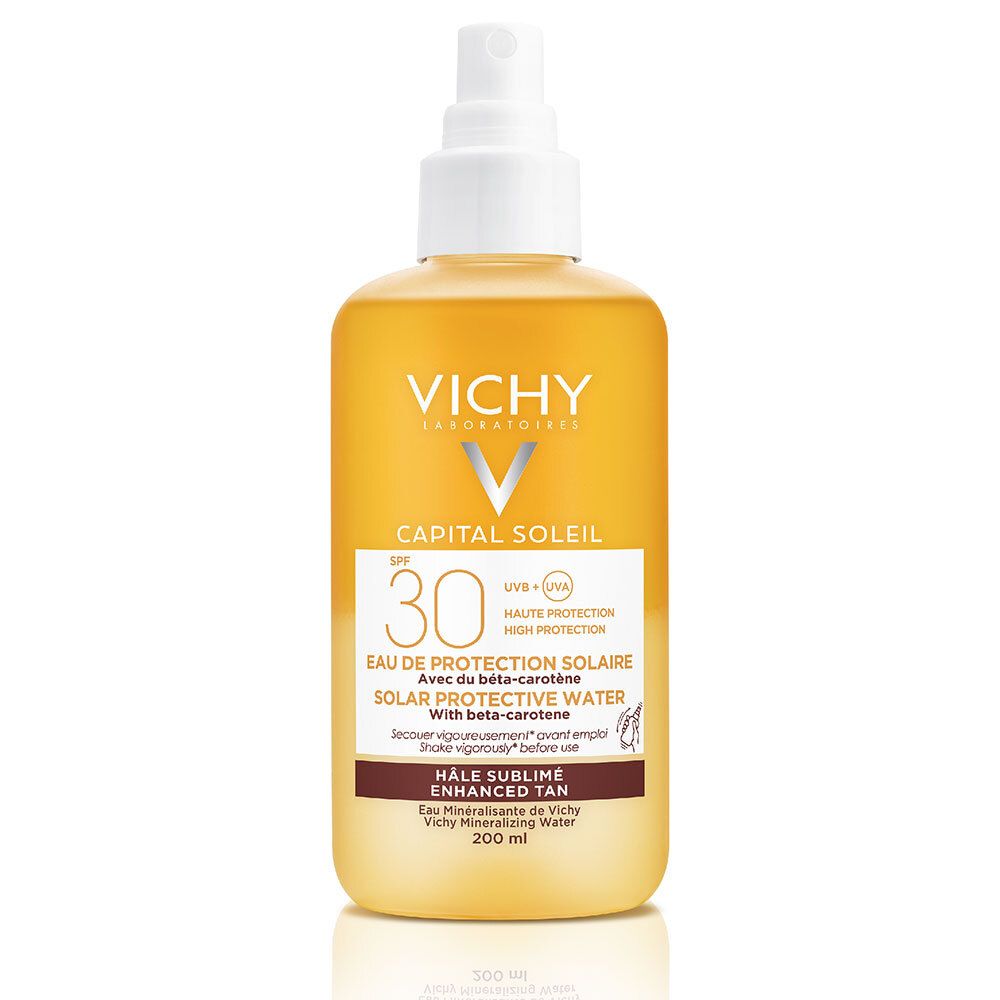 Spray solaire avec liquide jaune. Logo VICHY, CAPITAL SOLEIL, SPF 30, Solar Protective Water. 200 ml.