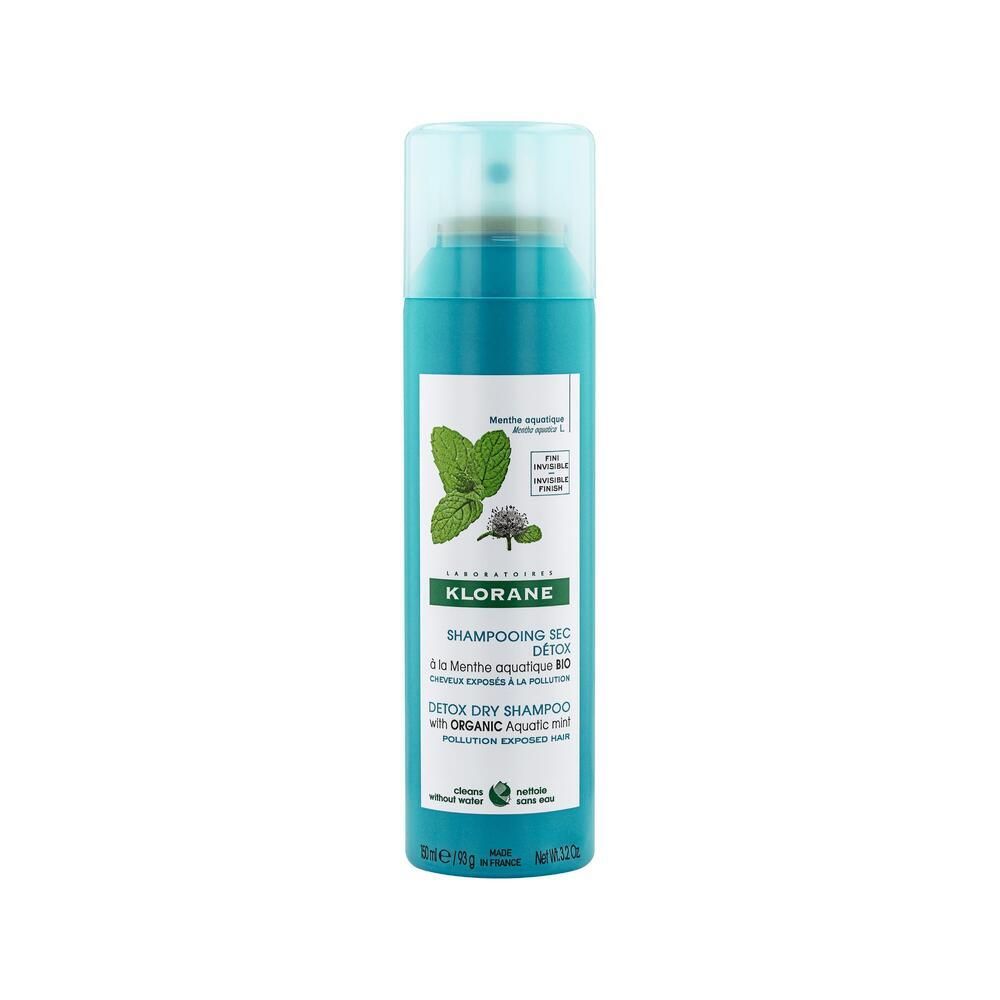 Türkis-farbene Sprühflasche mit Produktinformationen und Minz-Illustration. Trockenshampoo.