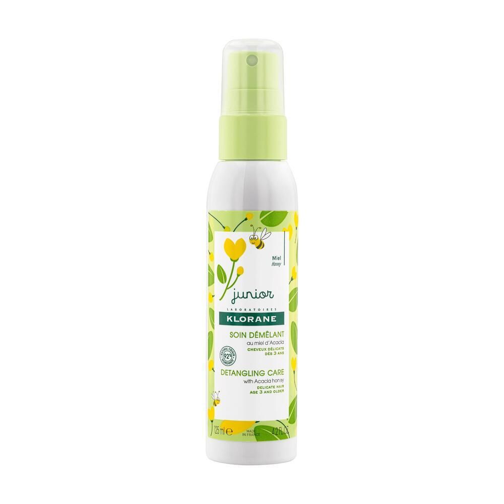 Klorane Soin Démêlant, flacon spray. Design vert et blanc avec éléments floraux et texte. 75 ml.