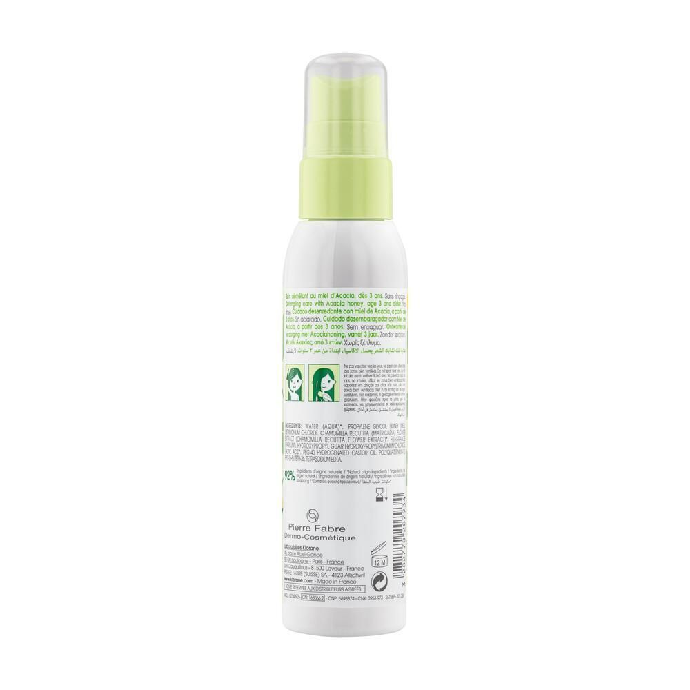 Dos du flacon spray Klorane. Texte multilingue. Contient des informations sur les ingrédients et le fabricant.
