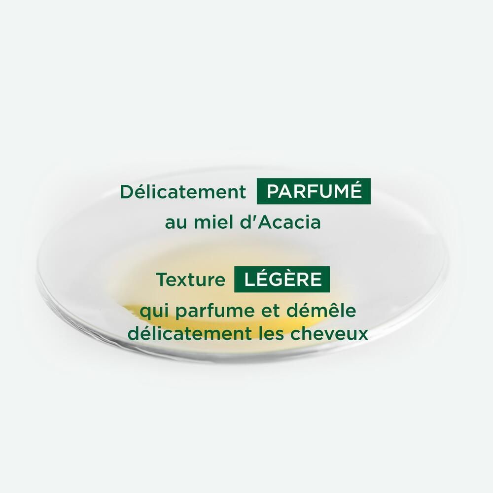 Coupelle transparente avec liquide jaunâtre. Texte: 'Délicatement PARFUMÉ au miel d’Acacia'. 'Texture LÉGÈRE'.