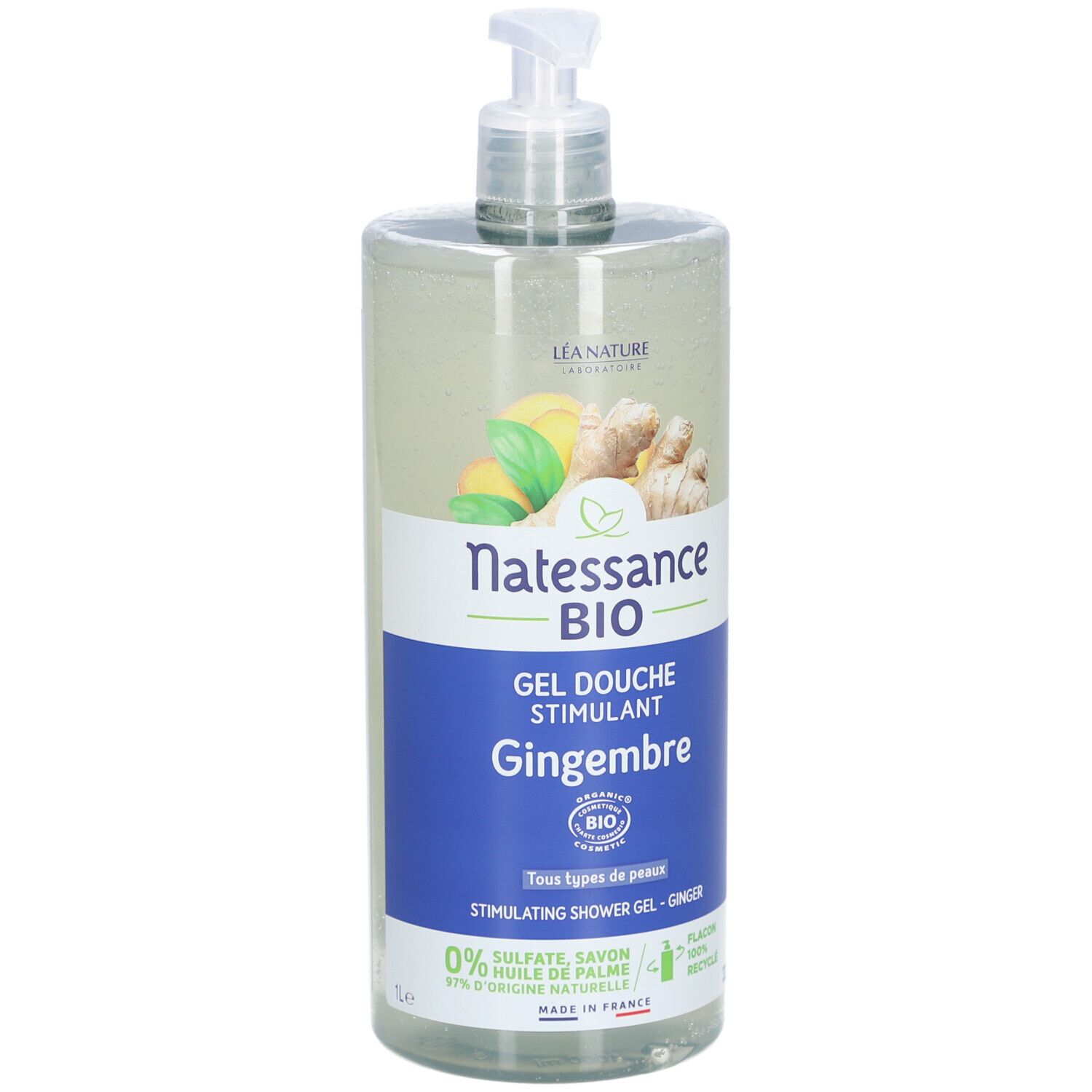 Flacon transparent avec pompe. Étiquette avec nom du produit, illustration de gingembre et label bio. Texte: Gel Douche Stimulant Gingembre.