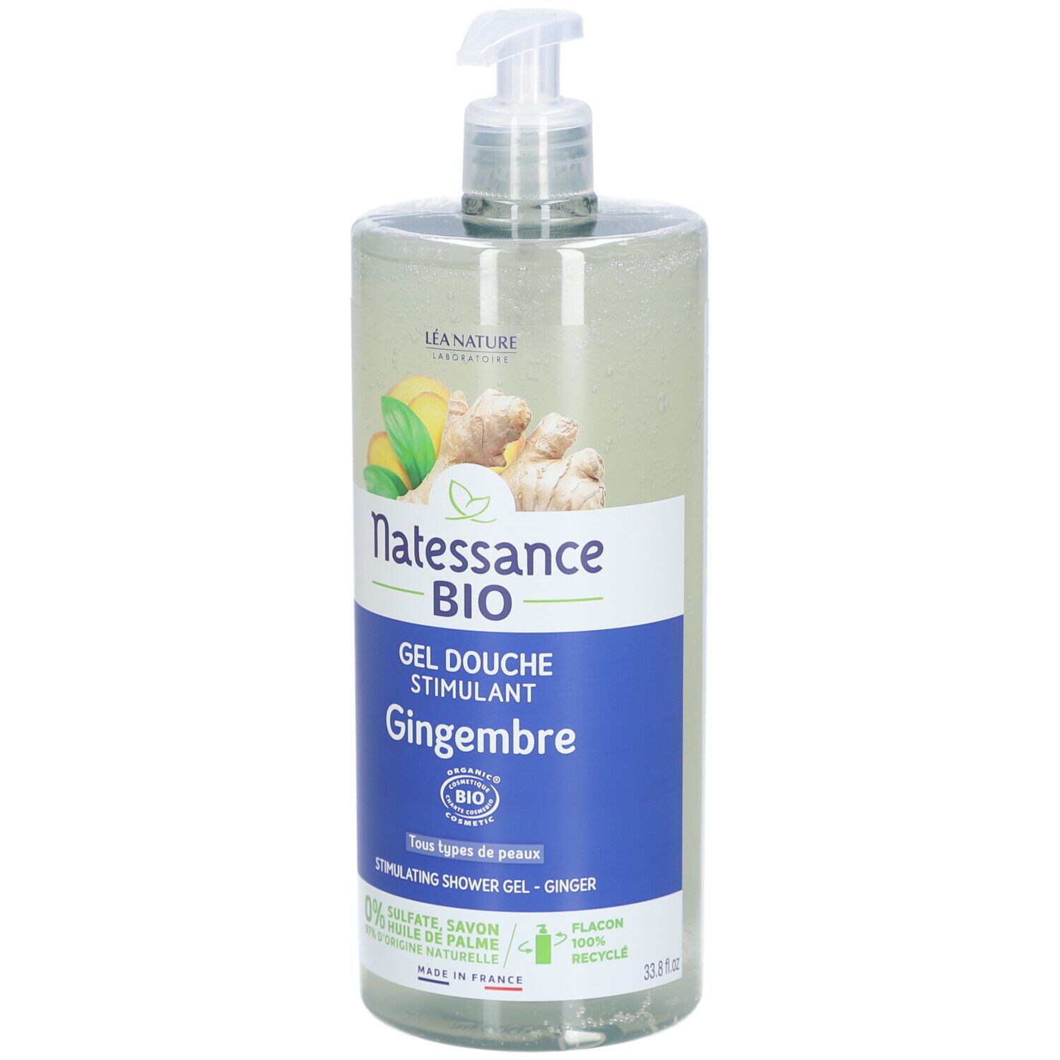 Flacon transparent avec pompe. Étiquette avec nom du produit, illustration de gingembre et label bio. Texte: Gel Douche Stimulant Gingembre.
