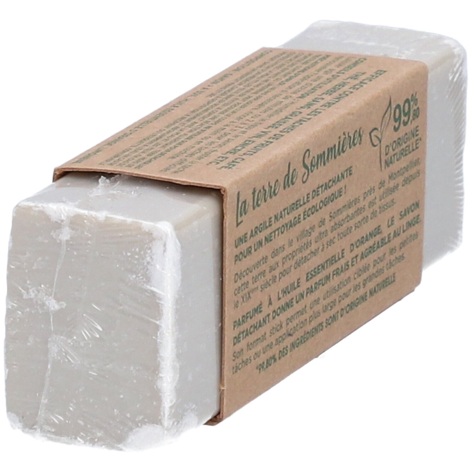 Pain de savon gris avec banderole en papier. Inscription: la terre de Sommières, 99% d'origine naturelle.