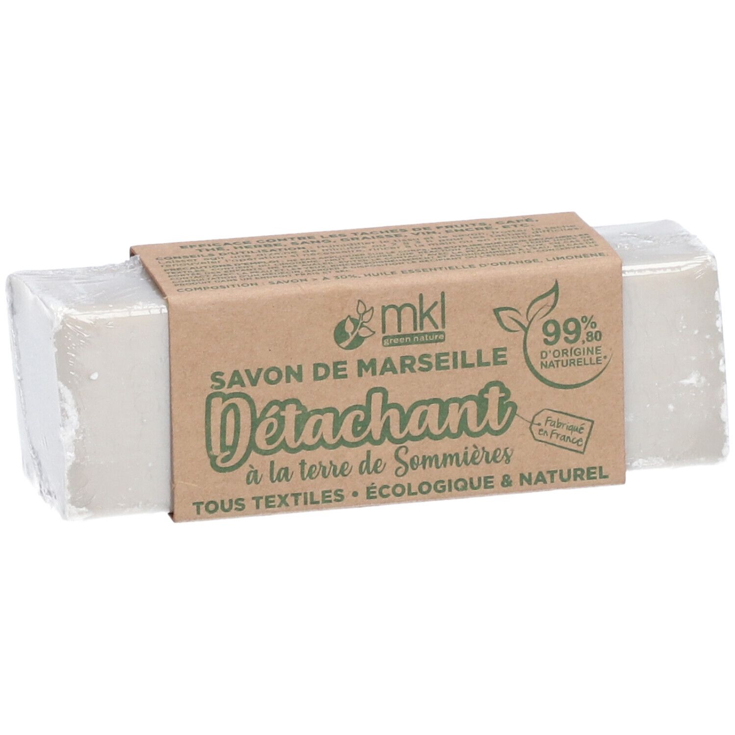 Pain de savon gris avec banderole en papier. Inscription: Savon de Marseille D
étachant, 99% d'origine naturelle.