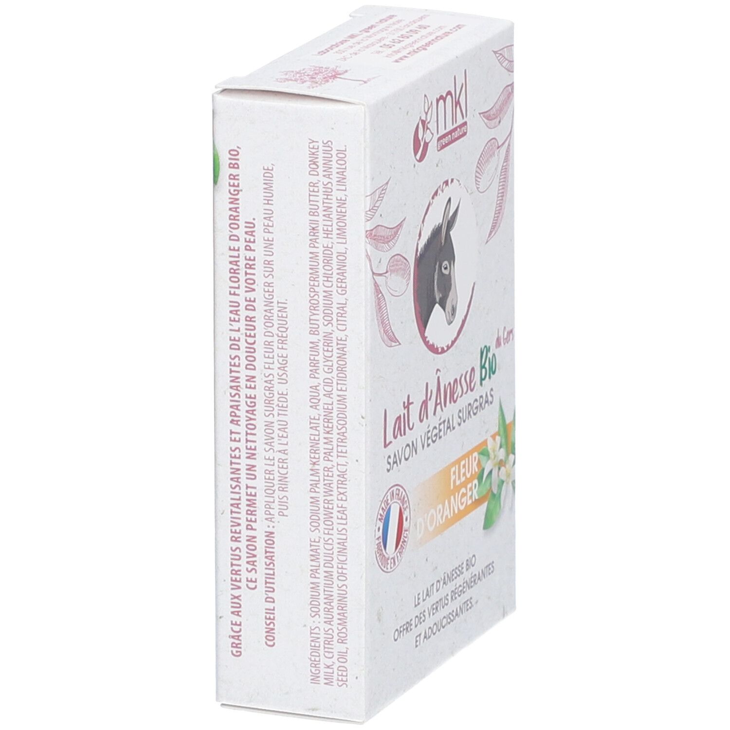Seifenverpackung mit Inhaltsstoffen und Anwendungshinweisen. Text: "Lait d'Ânesse Bio - Fleur d'Oranger". Logo "mkl green nature".