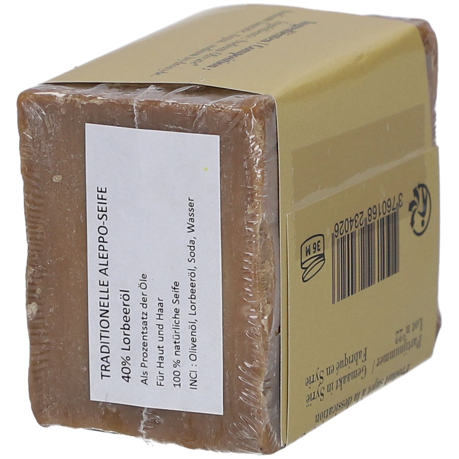 Seifenblock in Folie. Verpackung mit Text: Traditionelle Aleppo-Seife, 40% Lorbeeröl, für Haut und Haar.