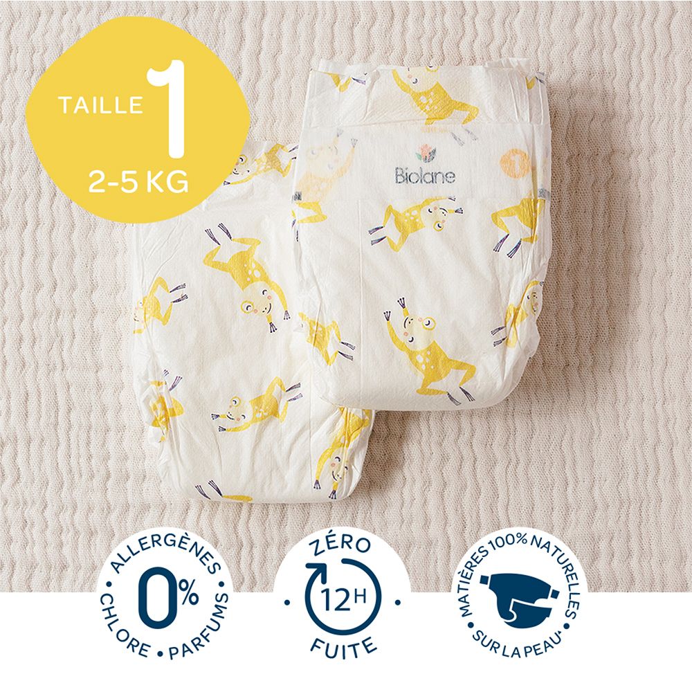 Deux couches Biolane Bio taille 1, 2-5 kg. Motif grenouille jaune. 0% chlore, parfum, 12h protection.