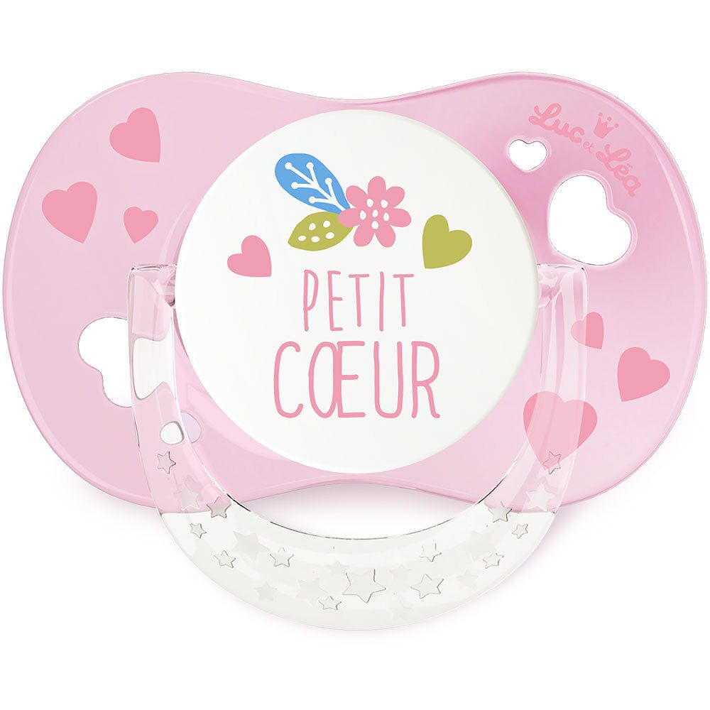 Sucette rose avec motif cœur et anneau. Inscription Petit Coeur. Marque Luc et Léa.