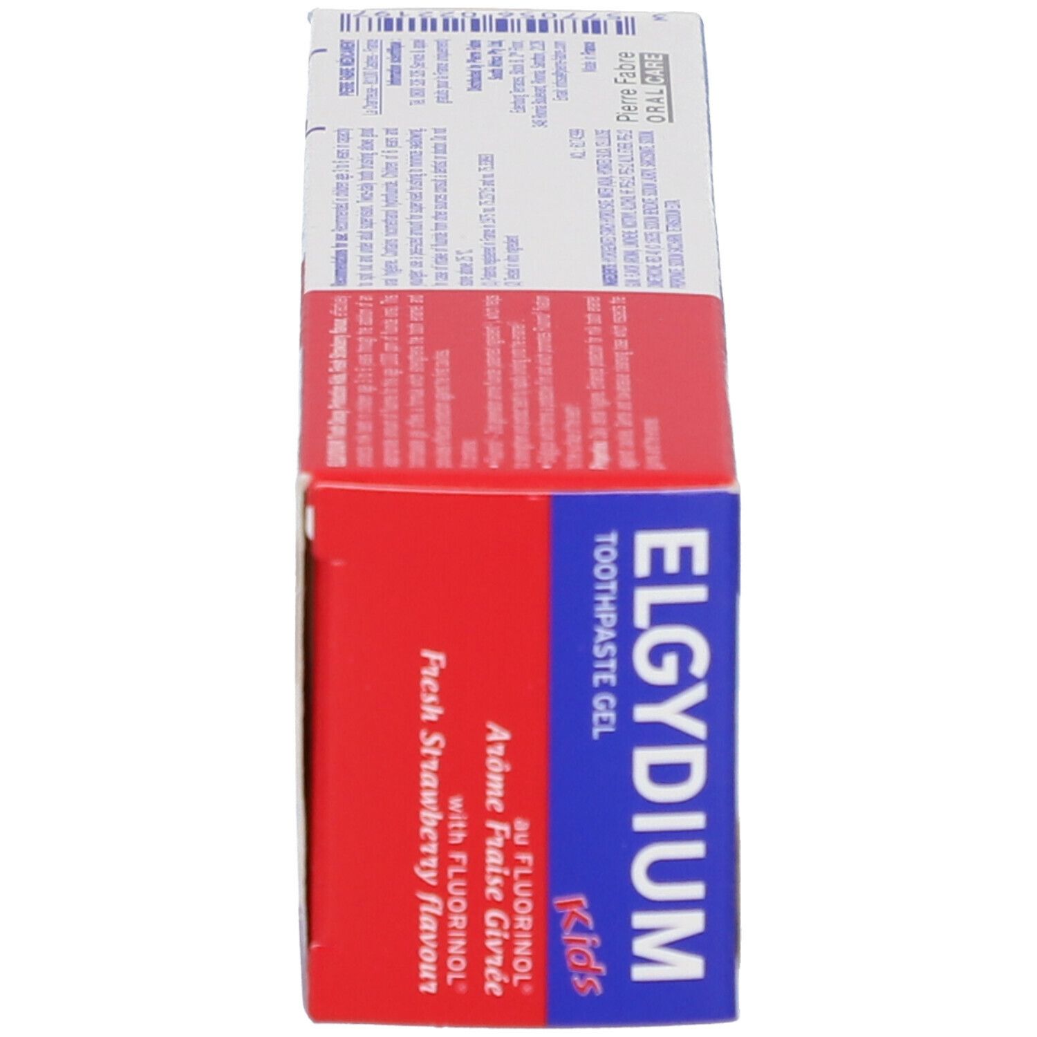 Vue latérale de la boîte de gel dentifrice. ELGYDIUM Kids, goût fraise. Emballage rouge et bleu. Texte en blanc.