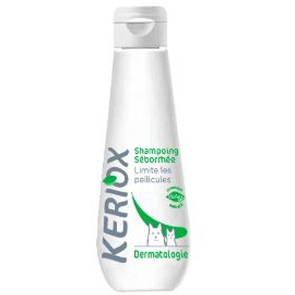 Witte shampoo fles. Opschrift: Keriox, Shampooing Séborrhée, Dermatologie. Afbeelding van hond en kat.