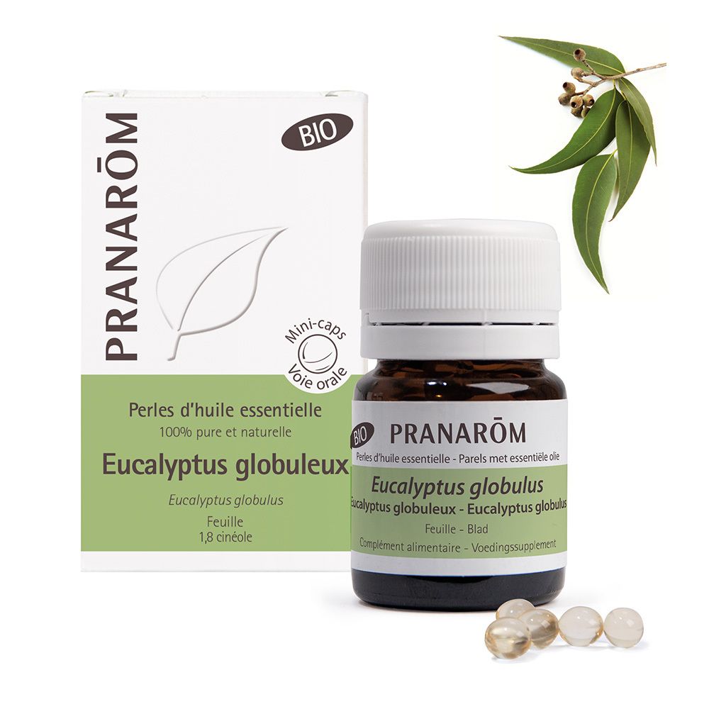 Flacon en verre brun avec bouchon blanc et étiquette. Boîte avec informations produit et branche d'eucalyptus.