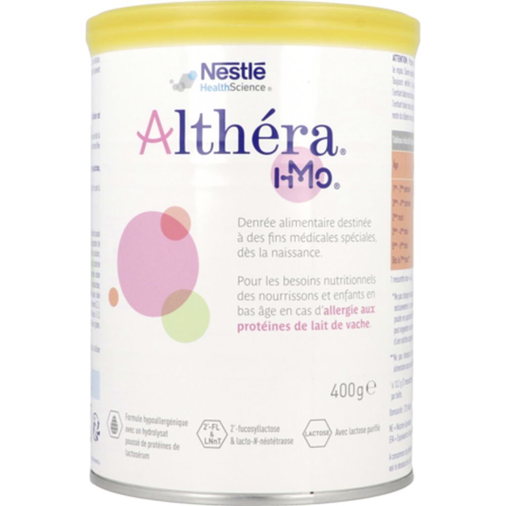 Boîte Nestlé Althéra I-Mo. Couvercle jaune, contenant blanc avec cercles roses et verts. Texte en français.