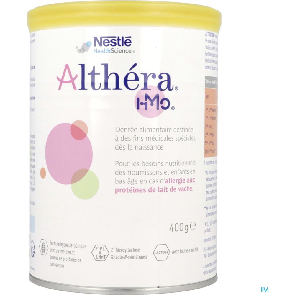 Boîte Nestlé Althéra I-Mo. Couvercle jaune, contenant blanc avec cercles roses et verts. Texte en français.