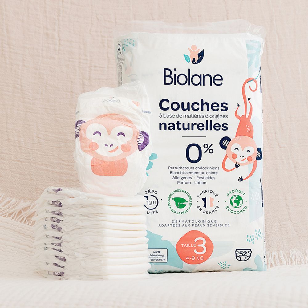Paquet et couche Biolane Bio-Windeln Gr. 3. Inscriptions : Couches naturelles, 0%, taille 3, 4-9 kg. Illustration singe.