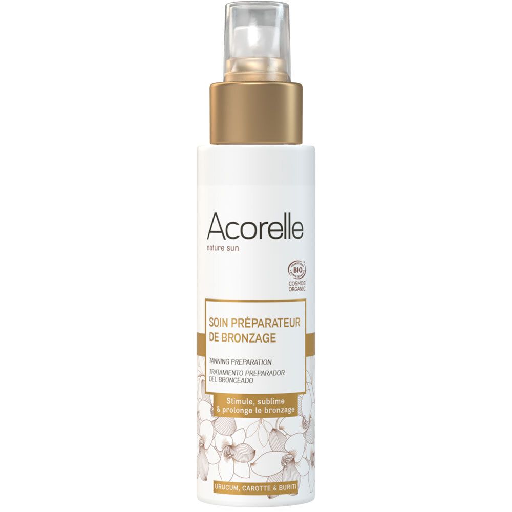 Flacon blanc avec vaporisateur doré. Inscription Acorelle, Soin Préparateur de Bronzage. Certification bio. Motif floral.