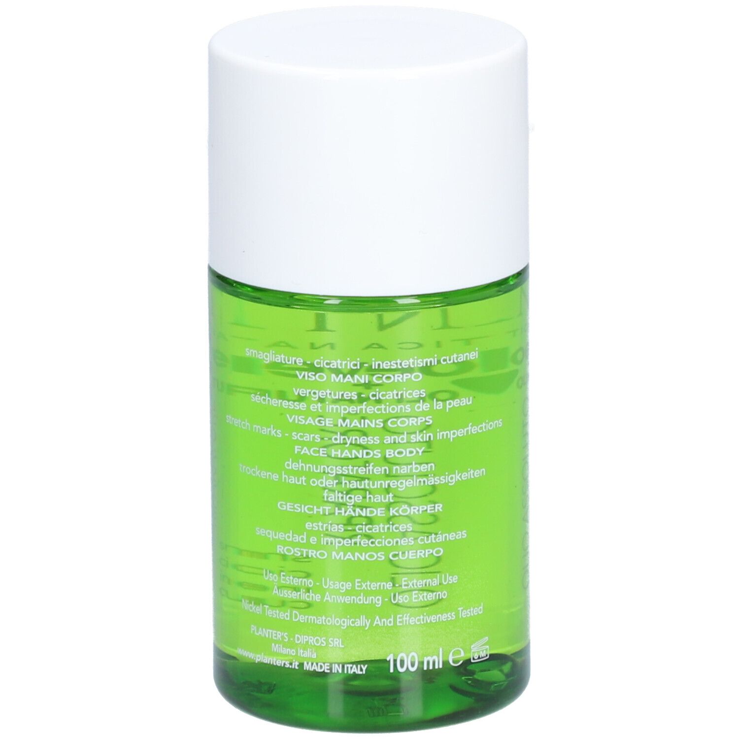 Dos du flacon en verre vert avec bouchon blanc. Texte: cicatrices, vergetures, peau sèche. 100 ml.