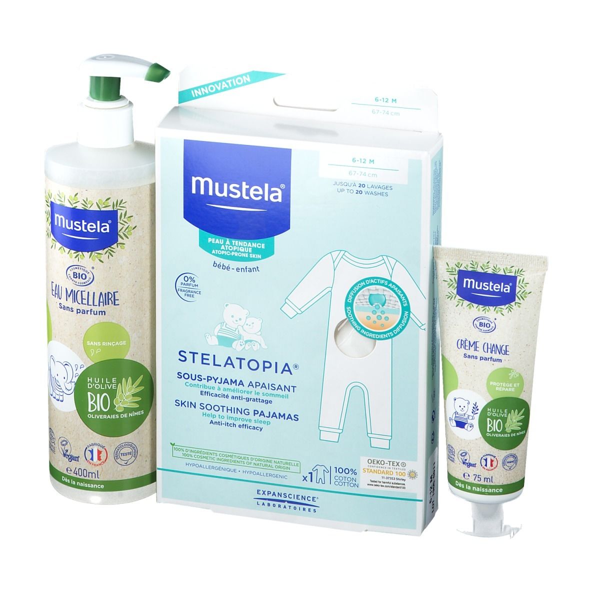 Ensemble avec flacon, emballage pyjama et tube. Flacon pompe, emballage pyjama avec motif bébé, tube à bouchon.