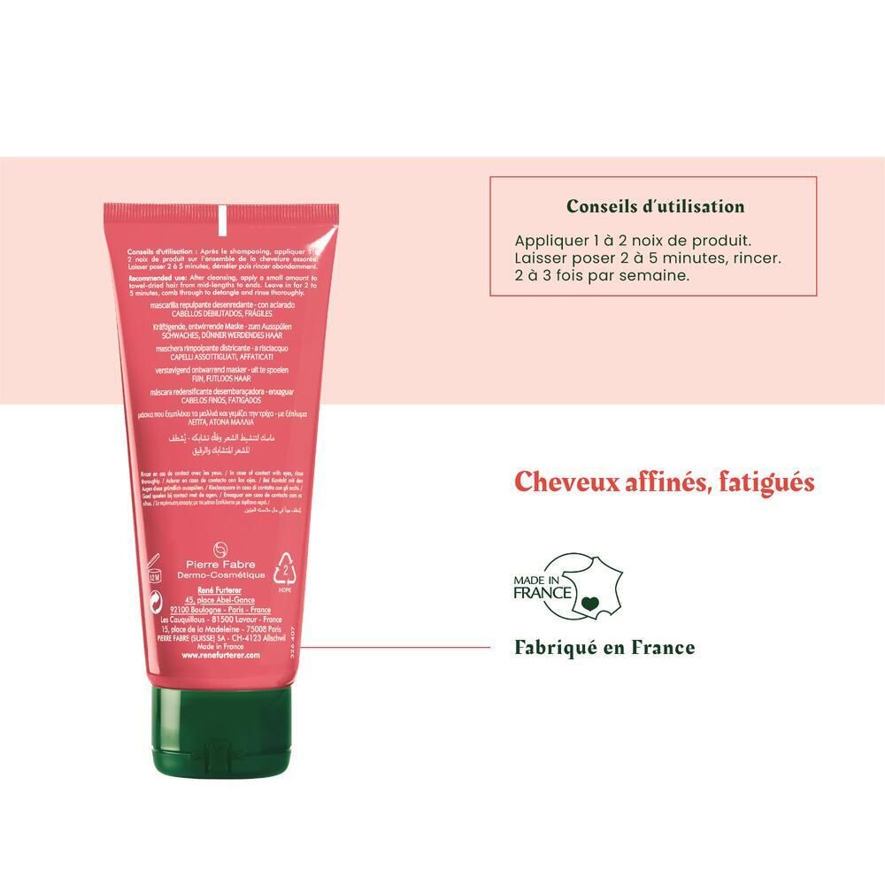 Tube rouge. Dos avec texte. Fabriqué en France. Instructions.