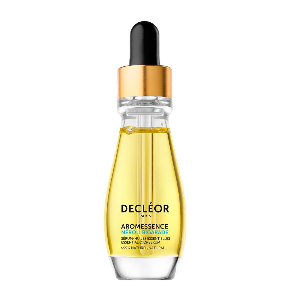 Flacon transparent avec sérum jaune. Pipette noire, bouchon doré. Texte : Decléor, Aromessence.