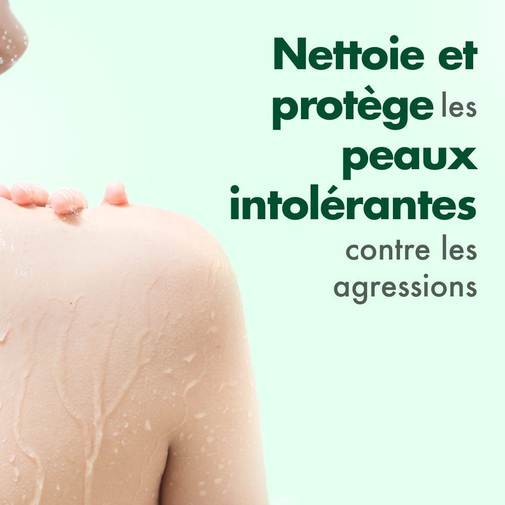 Gros plan sur une partie de la peau. Texte: Nettoie et protège les peaux intolérantes contre les agressions.