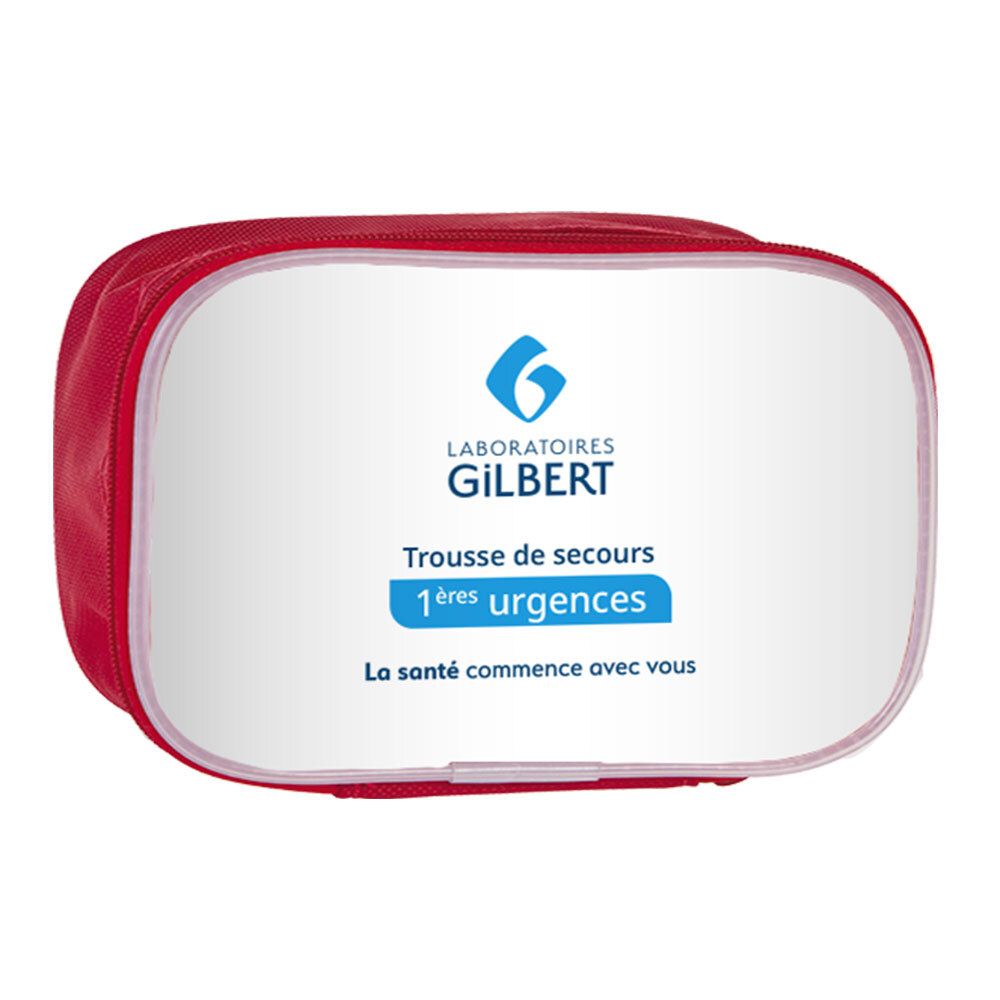 Trousse de secours rouge avec fenêtre blanche. Inscription: Laboratoires Gilbert, Trousse de secours 1ères urgences.