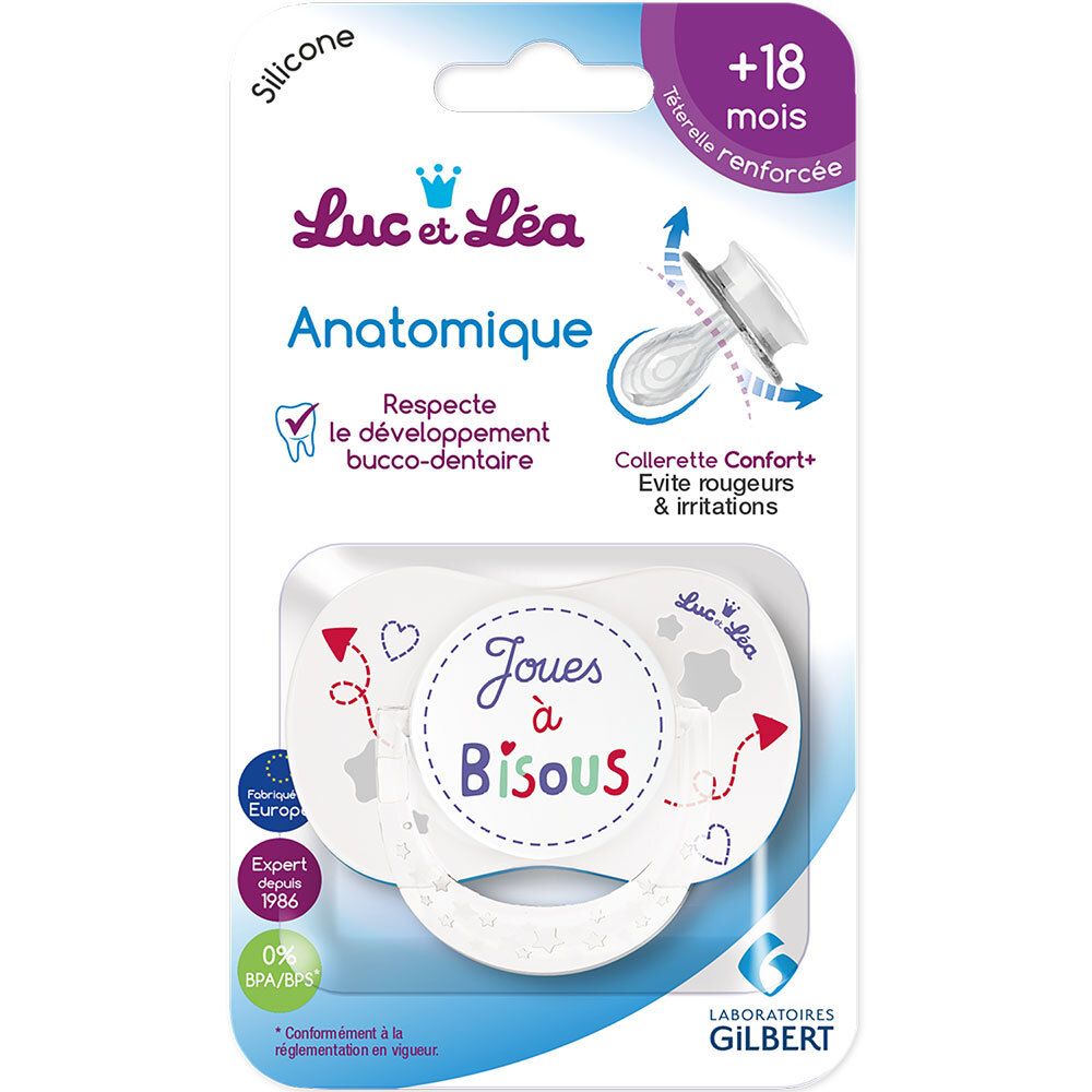 Emballage avec sucette. Sucette anatomique, marque Luc et Léa. Texte "Joues à Bisous". Âge +18 mois. Sans BPA.