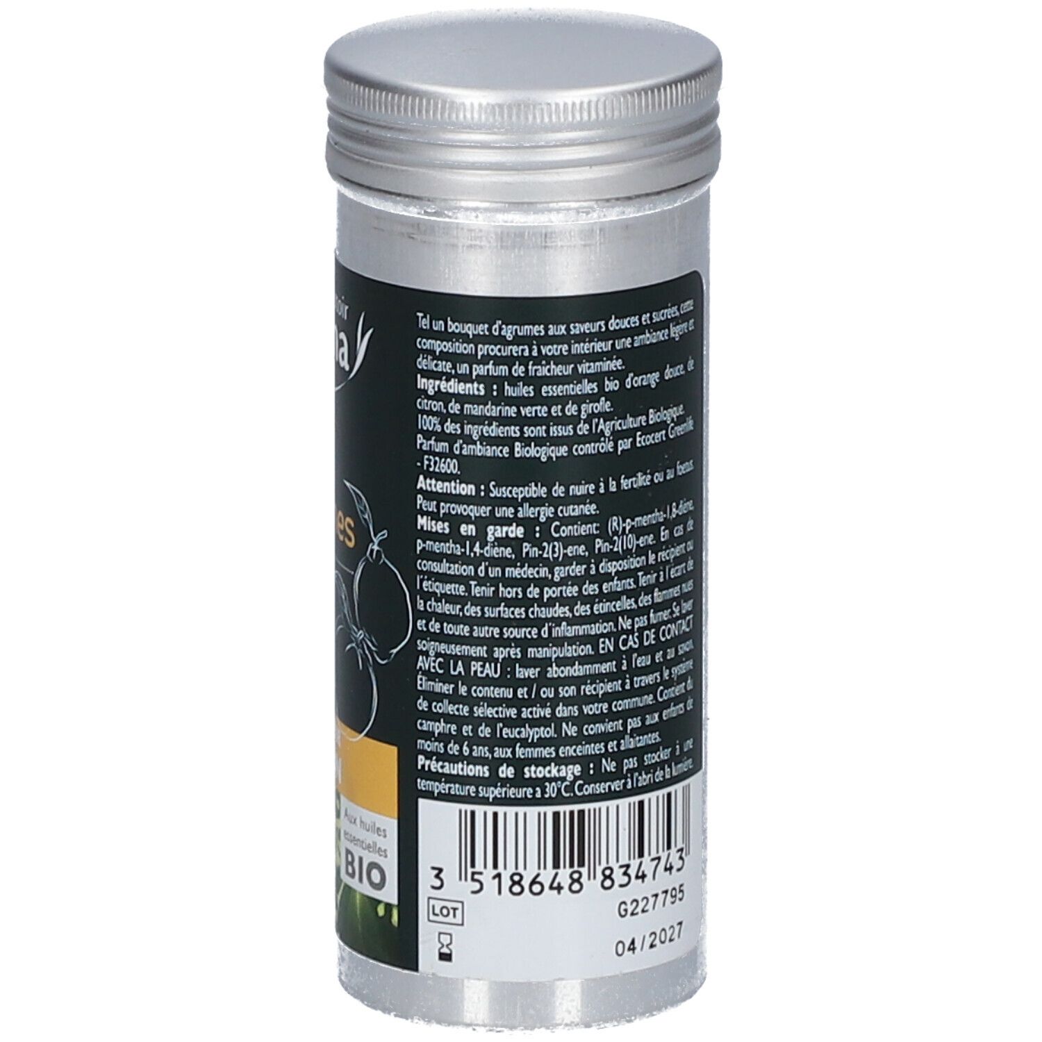 Flacon cylindrique à bouchon argenté. Étiquette noire avec texte et code-barres. Contient des informations sur les ingrédients et la durabilité.