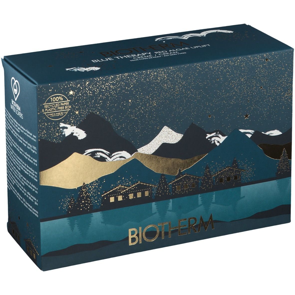 Dunkelblaue Geschenkbox mit Landschaftsmotiv und goldenen Akzenten. BIOTHERM-Logo unten. Text: BLUE THERAPY RED ALGAE UPLIFT.