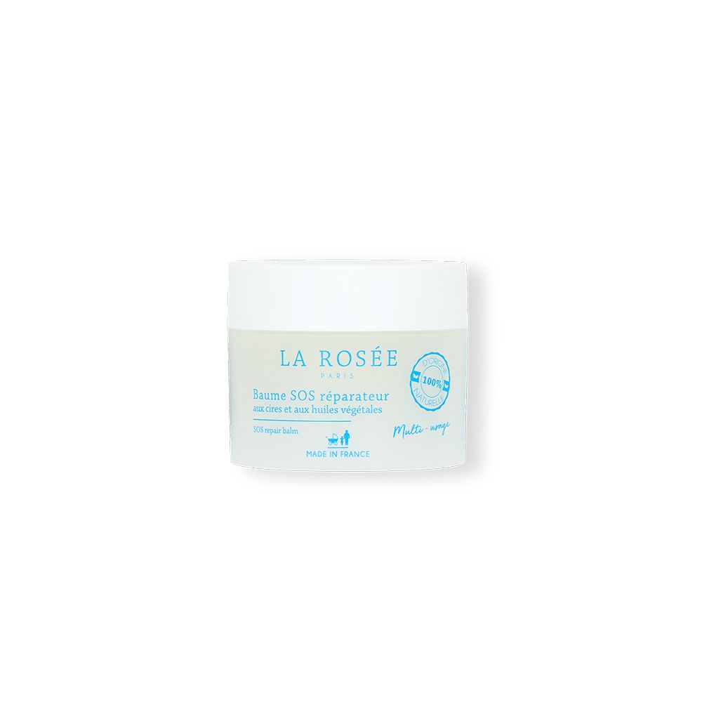Pot de crème avec couvercle blanc. Inscription : LA ROSÉE PARIS, Baume SOS réparateur. Logo et texte bleus.