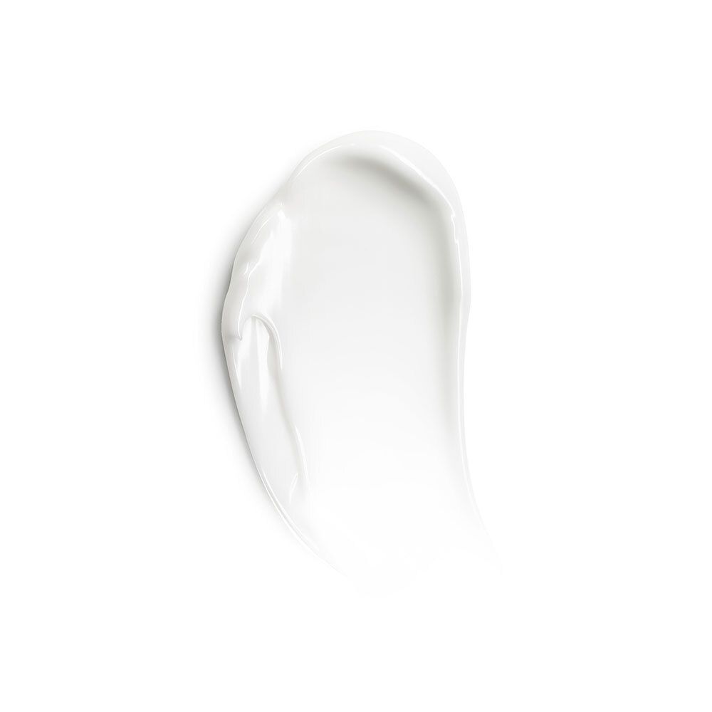 Tache de crème blanche. Texture lisse. Sur fond blanc.