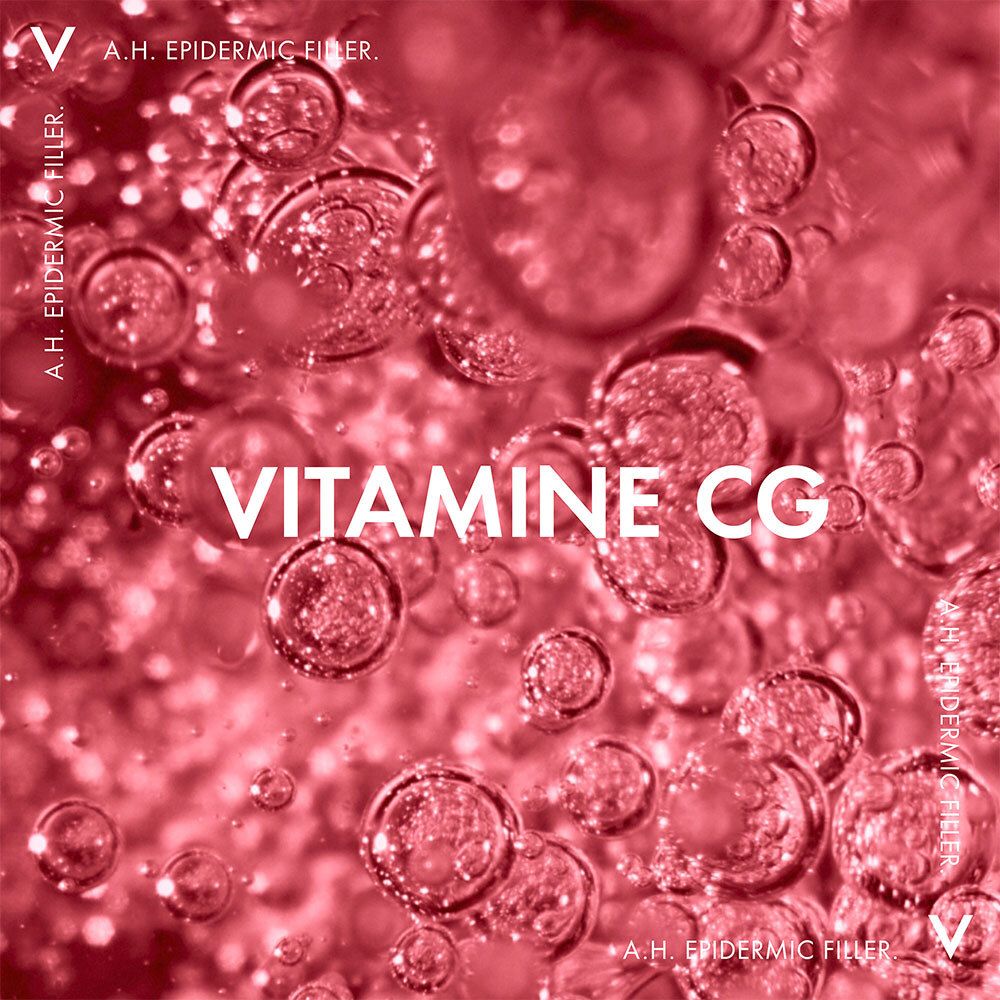 Gros plan sur des gouttes d'eau. Texte : Vitamine CG.