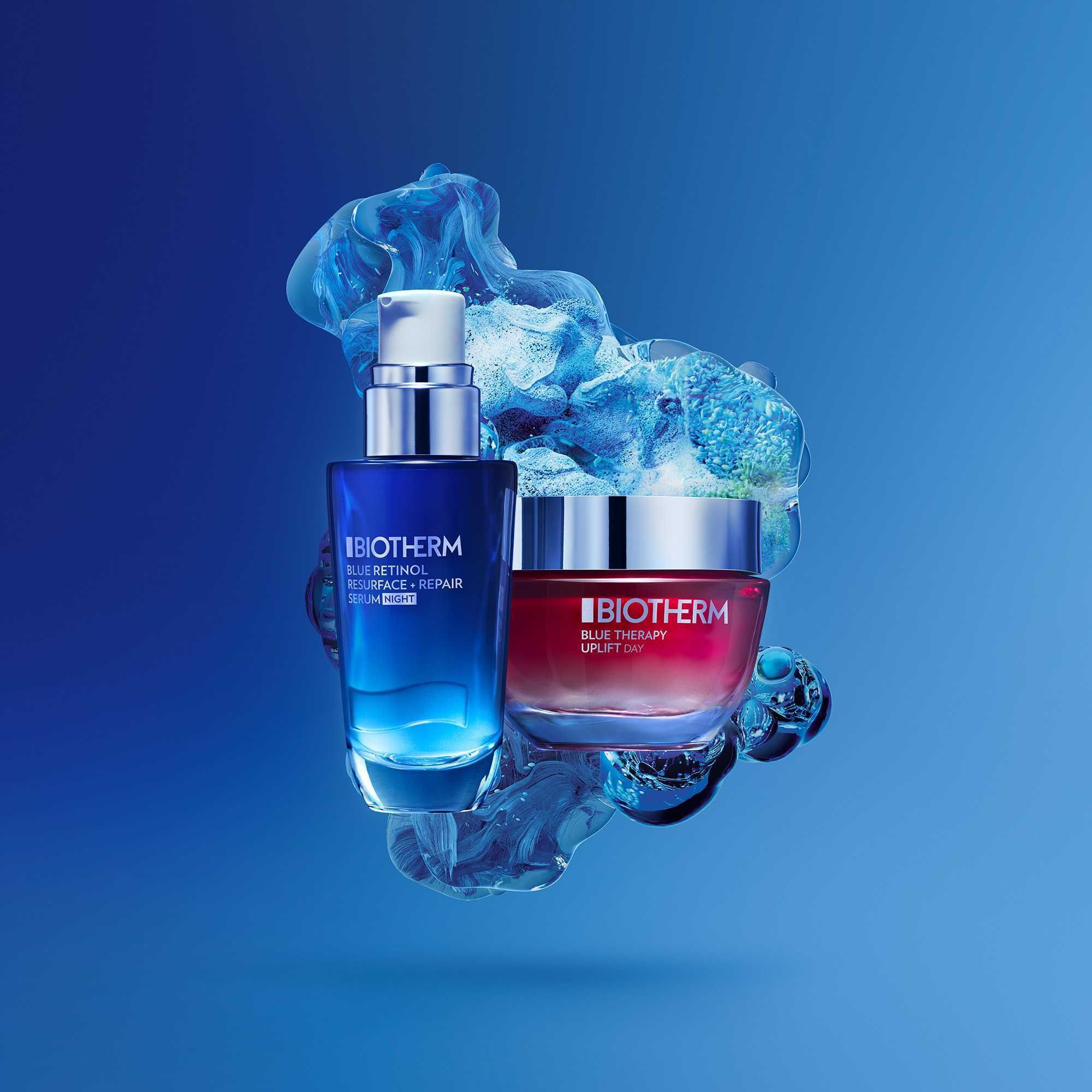 Blaues Serum und roter Tiegel. BIOTHERM BLUE THERAPY Serum und UPLIFT NIGHT Creme.