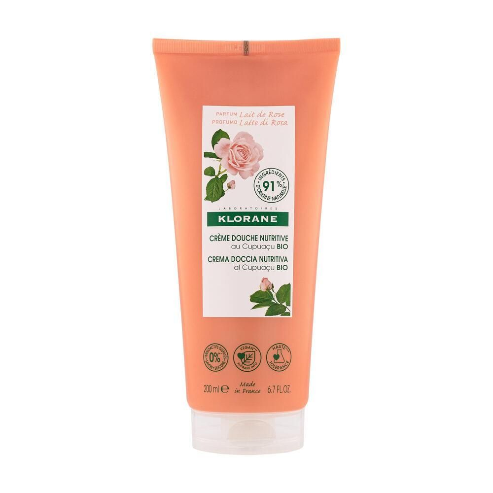 Tube orange de Klorane Duschgel Rosenmilch avec étiquette blanche. Rose, certification bio, texte.