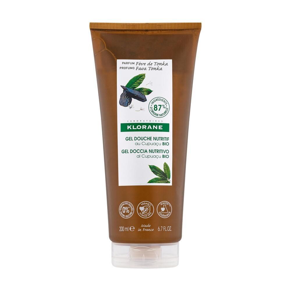 Tube de gel douche marron avec étiquette blanche. Texte: Klorane, Gel Douche Nutritif, Cupuaçu Bio. 87% ingrédients naturels.