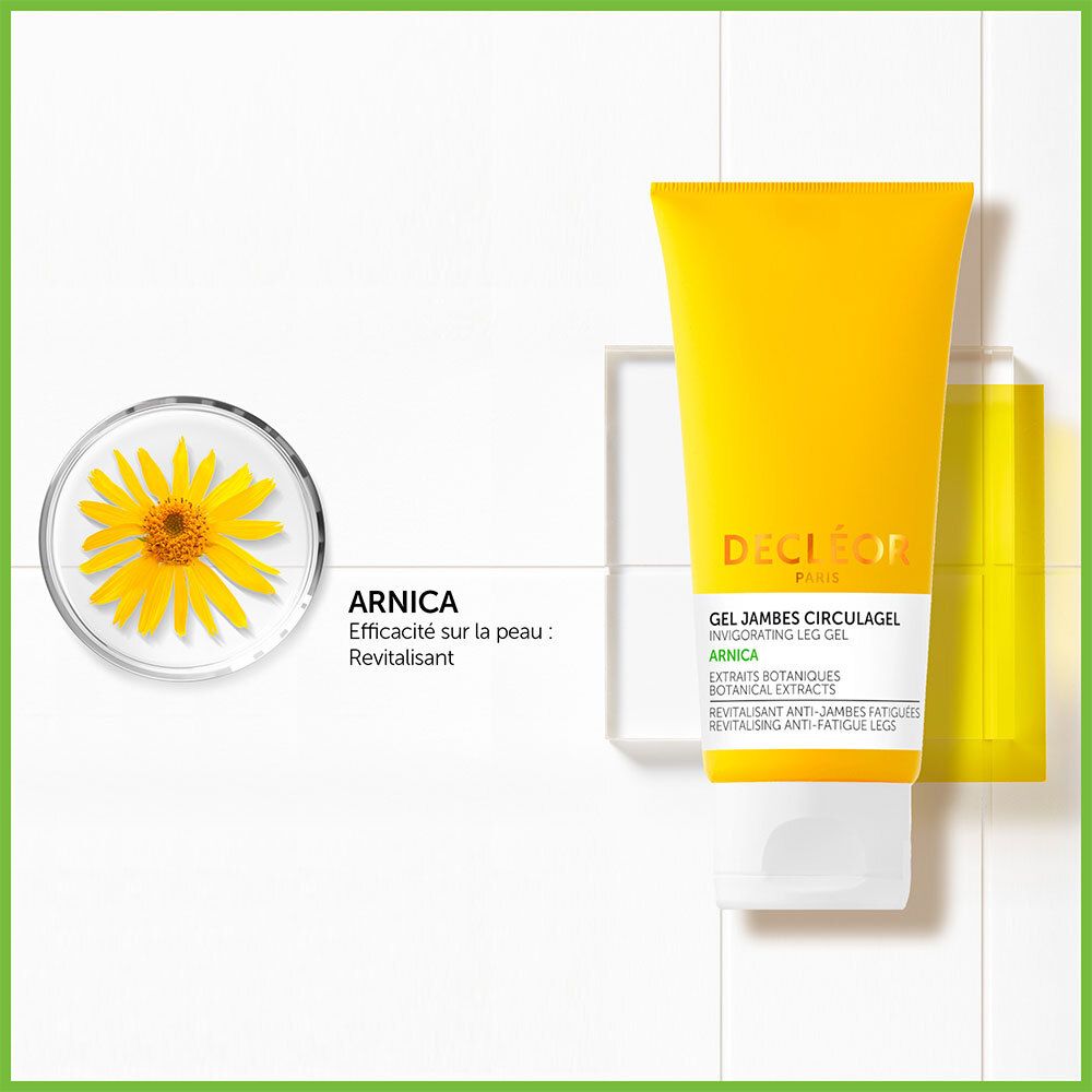 Tube de gel et fleur. Tube jaune avec bouchon blanc. DECLÉOR PARIS. Gel Jambes Circulagel. Fleur d'arnica.