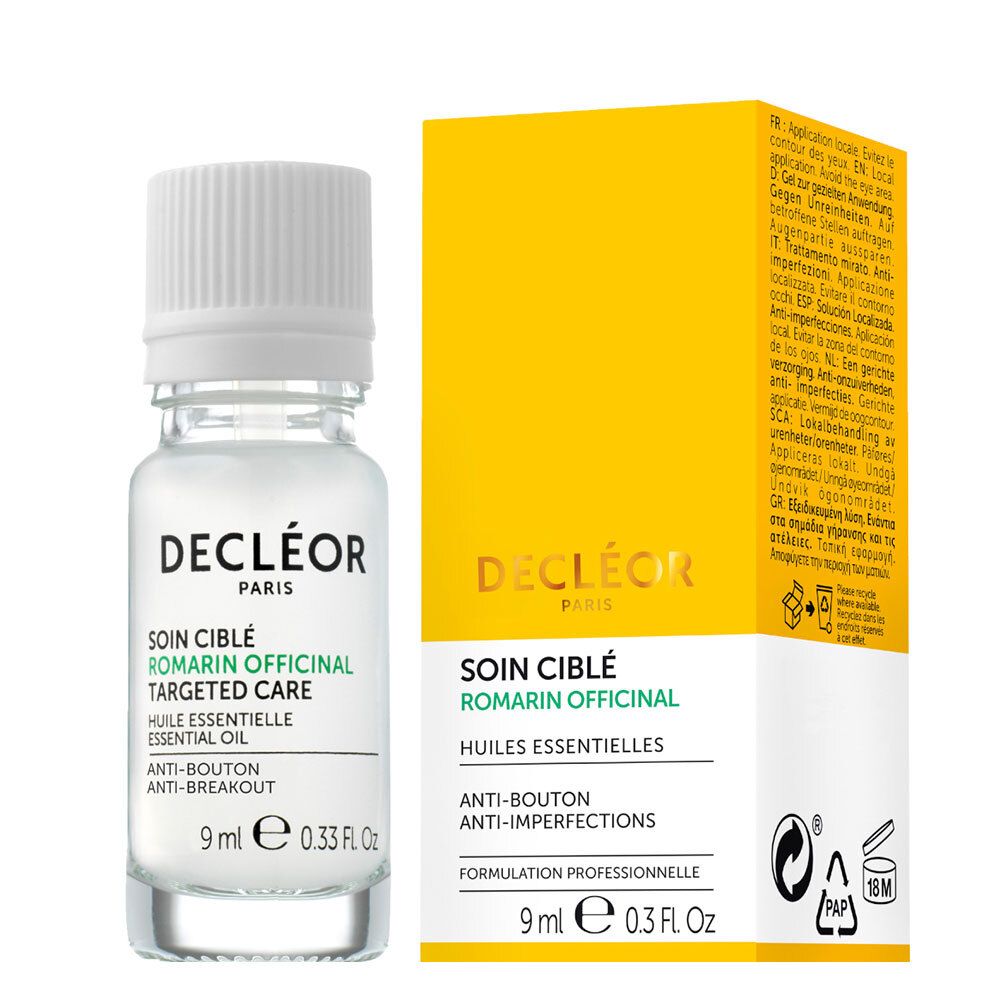 Produktflasche und gelbe Verpackung. DECLÉOR PARIS, SOIN CIBLÉ, Rosmarin Officinal, 9 ml.