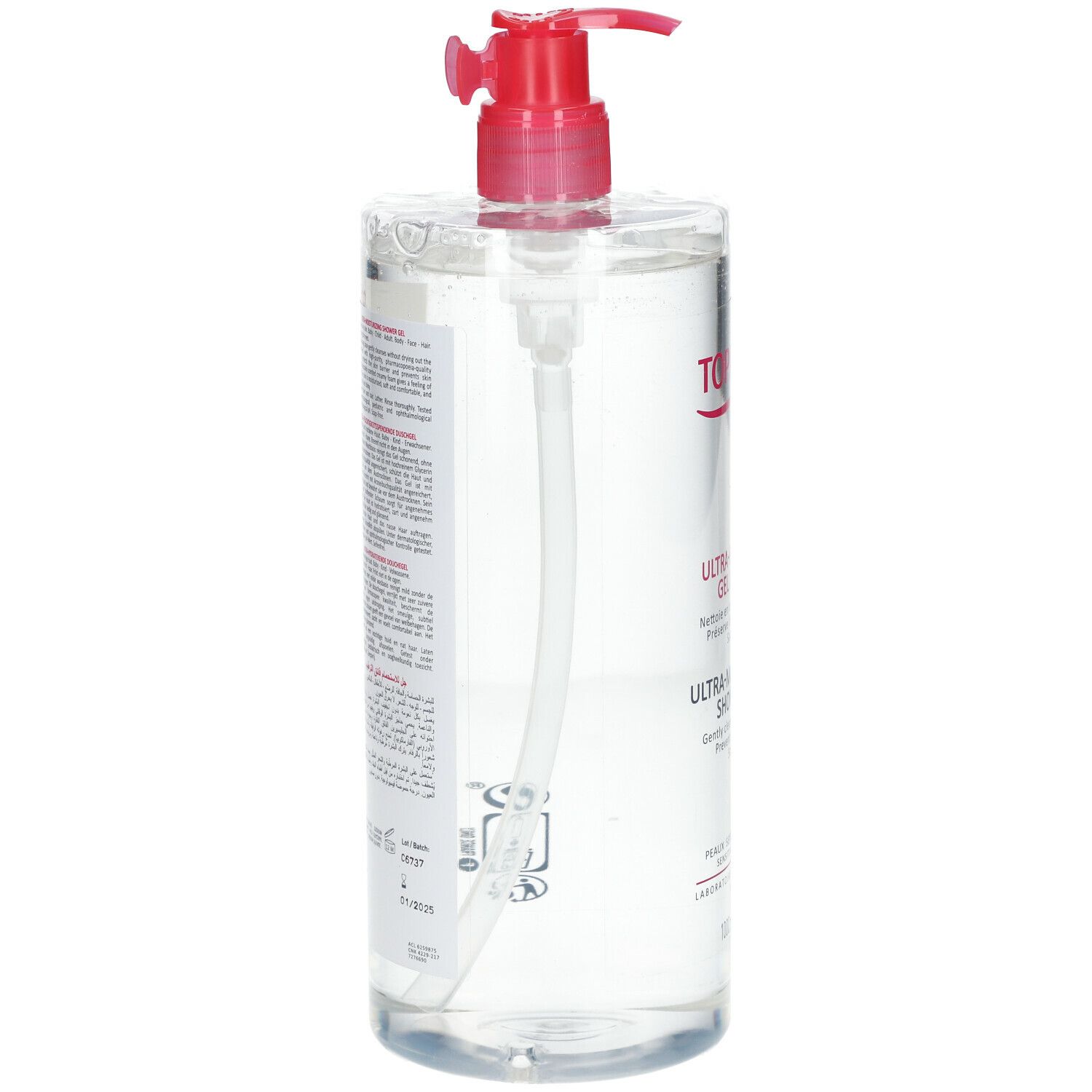 Flacon transparent avec pompe rouge. Texte au dos. Pompe et tube visibles.