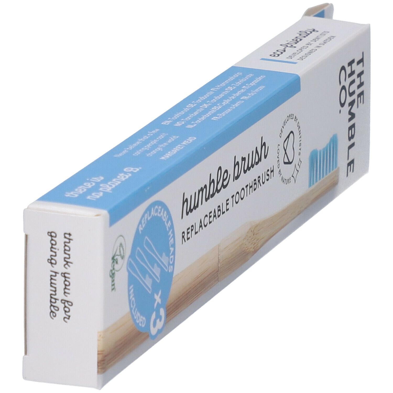 Emballage de brosse à dents. Contient 3 têtes de rechange. Soies bleues. Inscription : Humble Brush, The Humble Co.