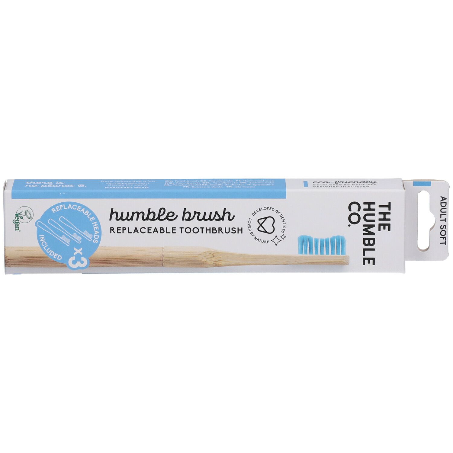 Emballage de brosse à dents. Contient 3 têtes de rechange. Soies bleues. Inscription : Humble Brush, The Humble Co.
