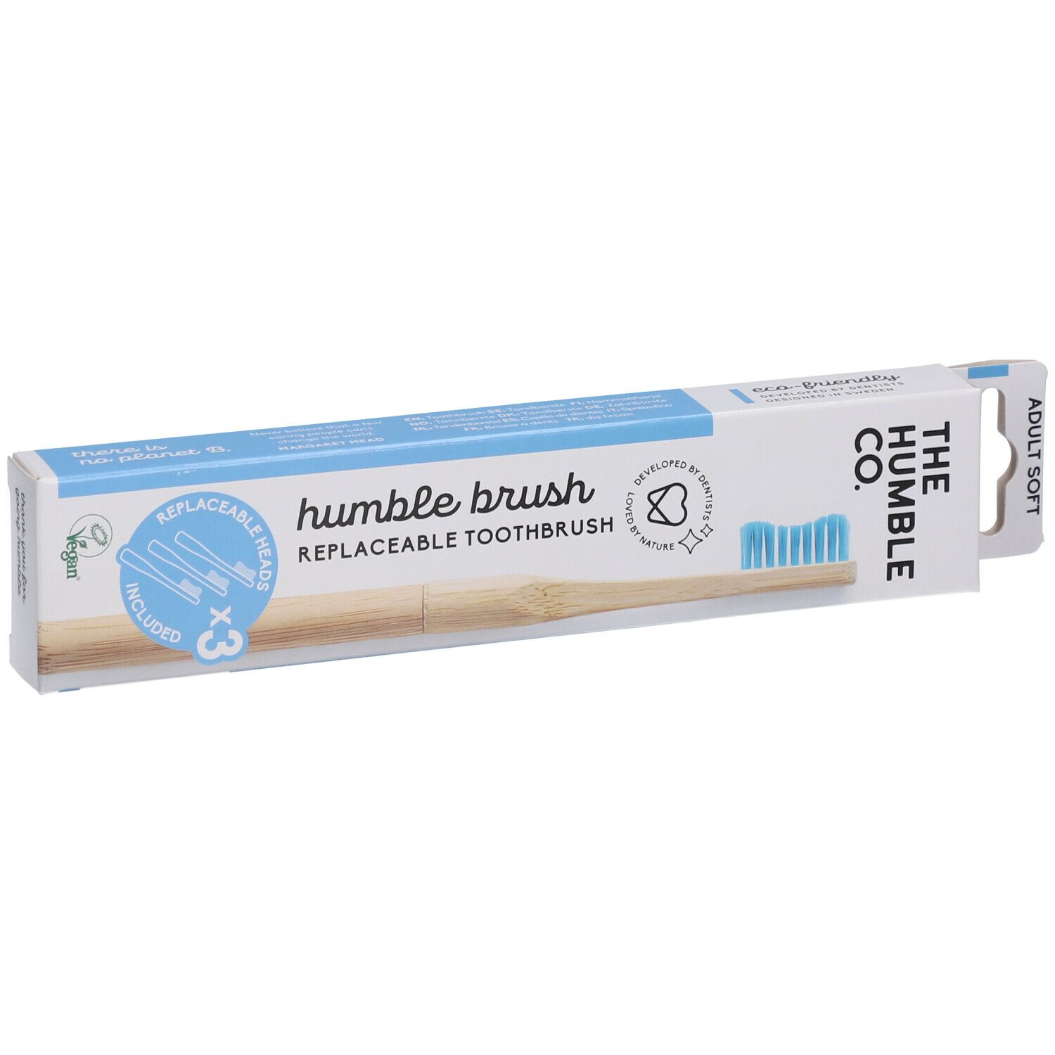 Emballage de brosse à dents. Contient 3 têtes de rechange. Soies bleues. Inscription : Humble Brush, The Humble Co.