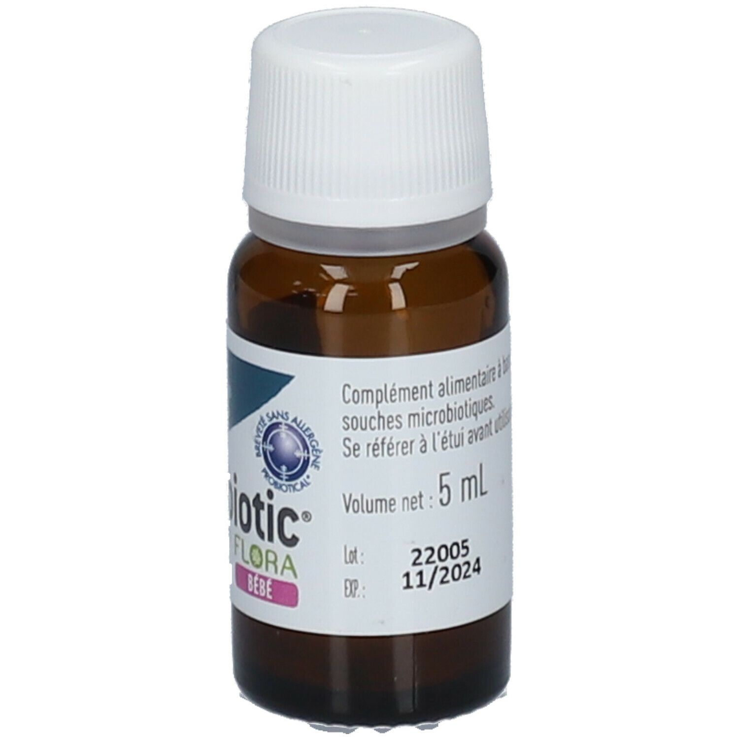 Flacon en verre brun avec bouchon blanc. Étiquette avec texte. Volume: 5 ml. Date d'expiration: 11/2024.