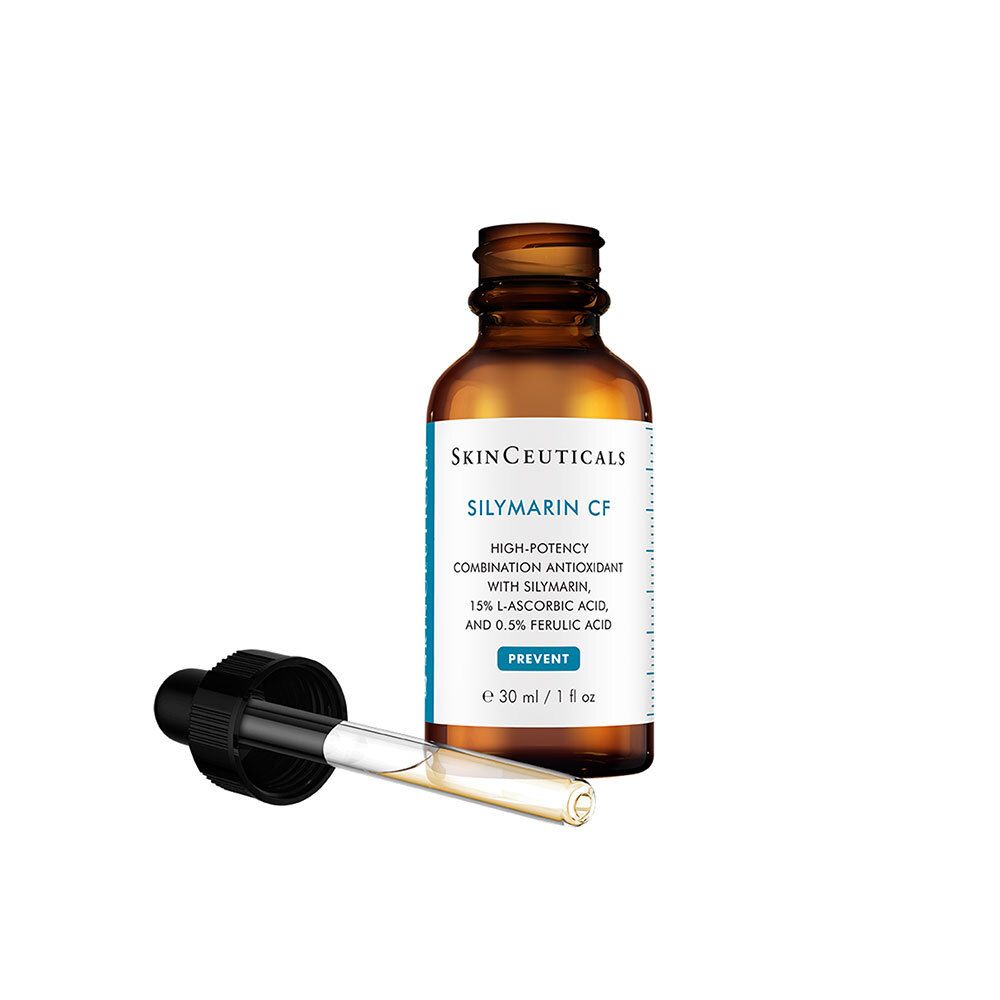 Flacon en verre brun avec pipette. SkinCeuticals Silymarin CF. Pipette avec liquide à côté.