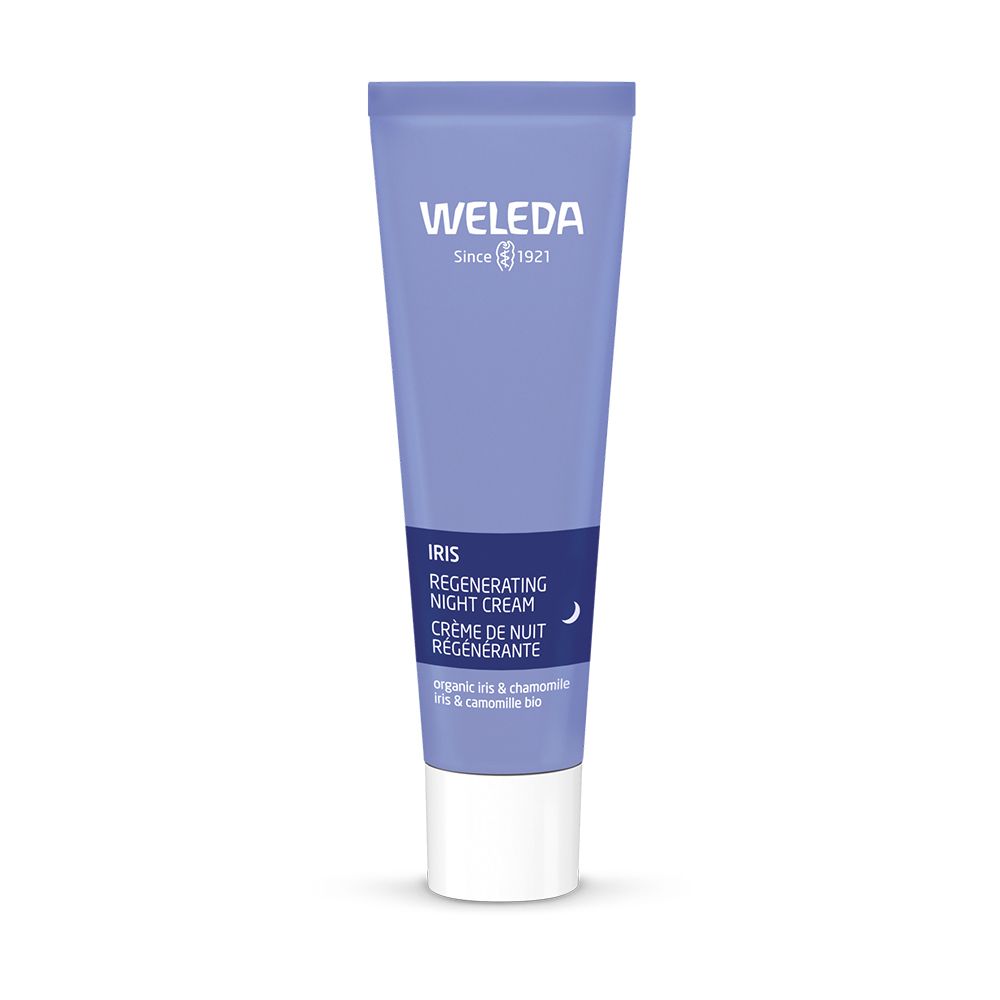 Weleda-Tube. Violett, mit Produktnamen und Iris-Abbildung. Weißer Deckel.