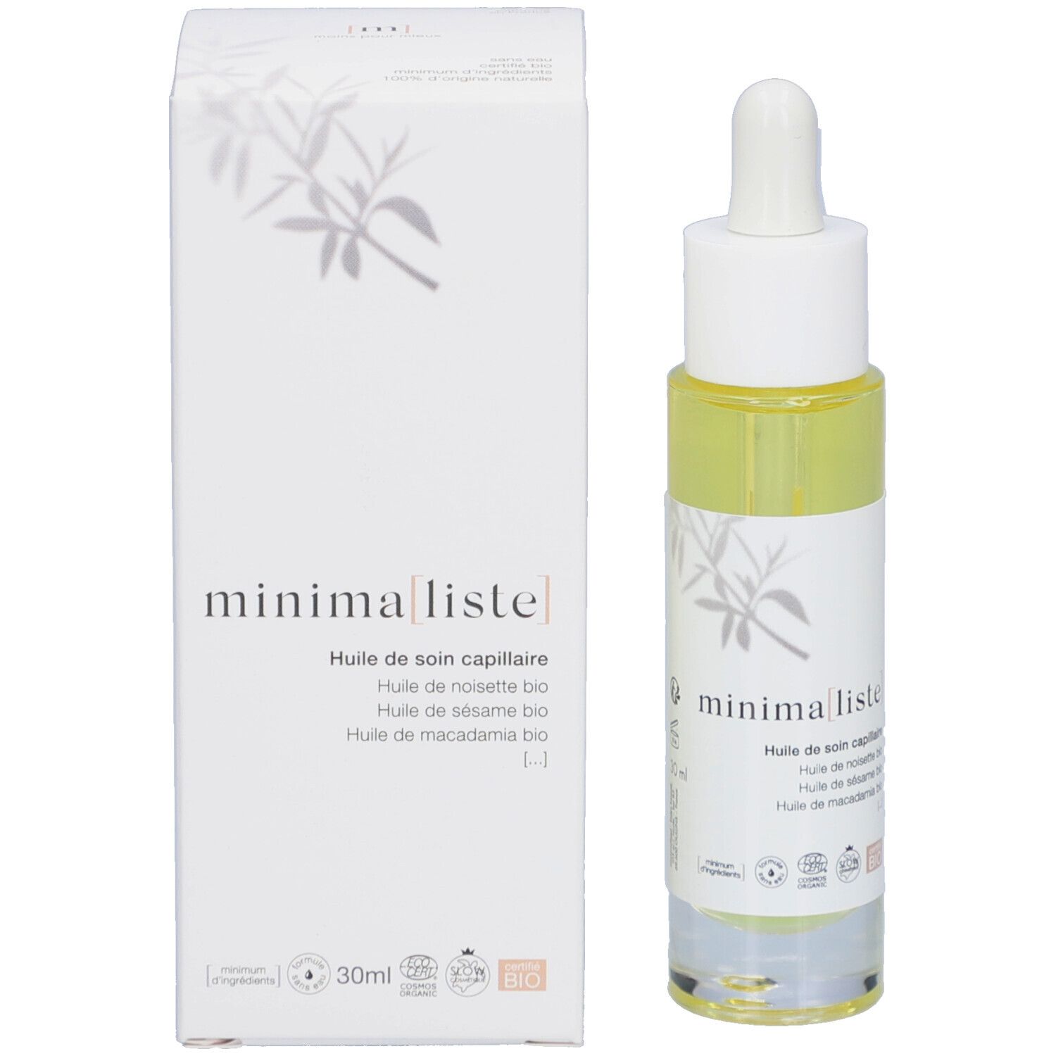 Flacon d'huile capillaire avec pipette et emballage. Nom du produit et certifications sur l'emballage.