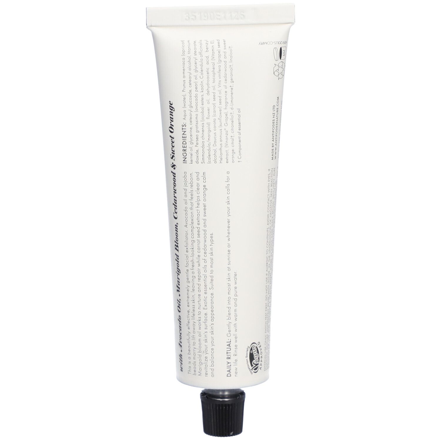 Dos du tube blanc. Texte: Ingrédients, rituel quotidien, symboles de recyclage.
