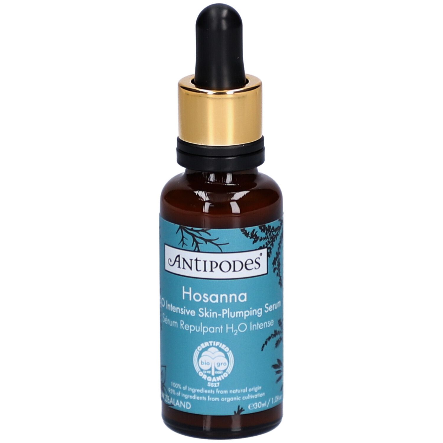 Flacon en verre brun avec bouchon doré et pipette. Inscription: Antipodes Hosanna Serum. Produit bio certifié.