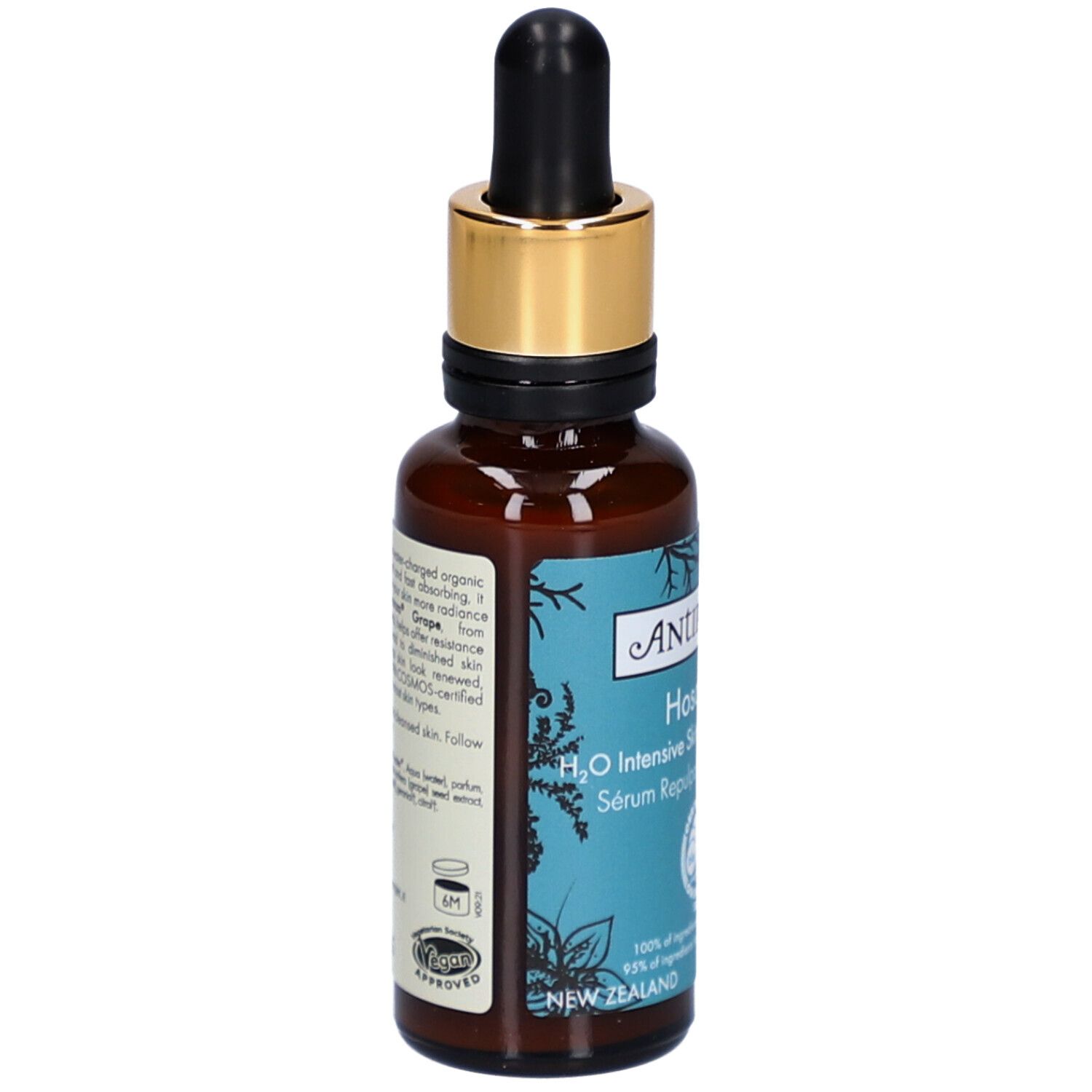 Flacon en verre brun avec bouchon doré et pipette. Inscription: Antipodes Hosanna Serum. Produit bio certifié.