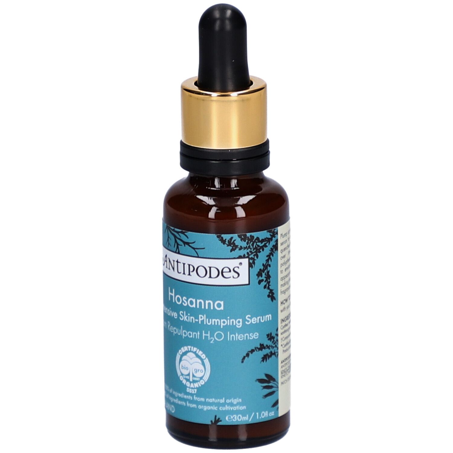Flacon en verre brun avec bouchon doré et pipette. Inscription: Antipodes Hosanna Serum. Produit bio certifié.