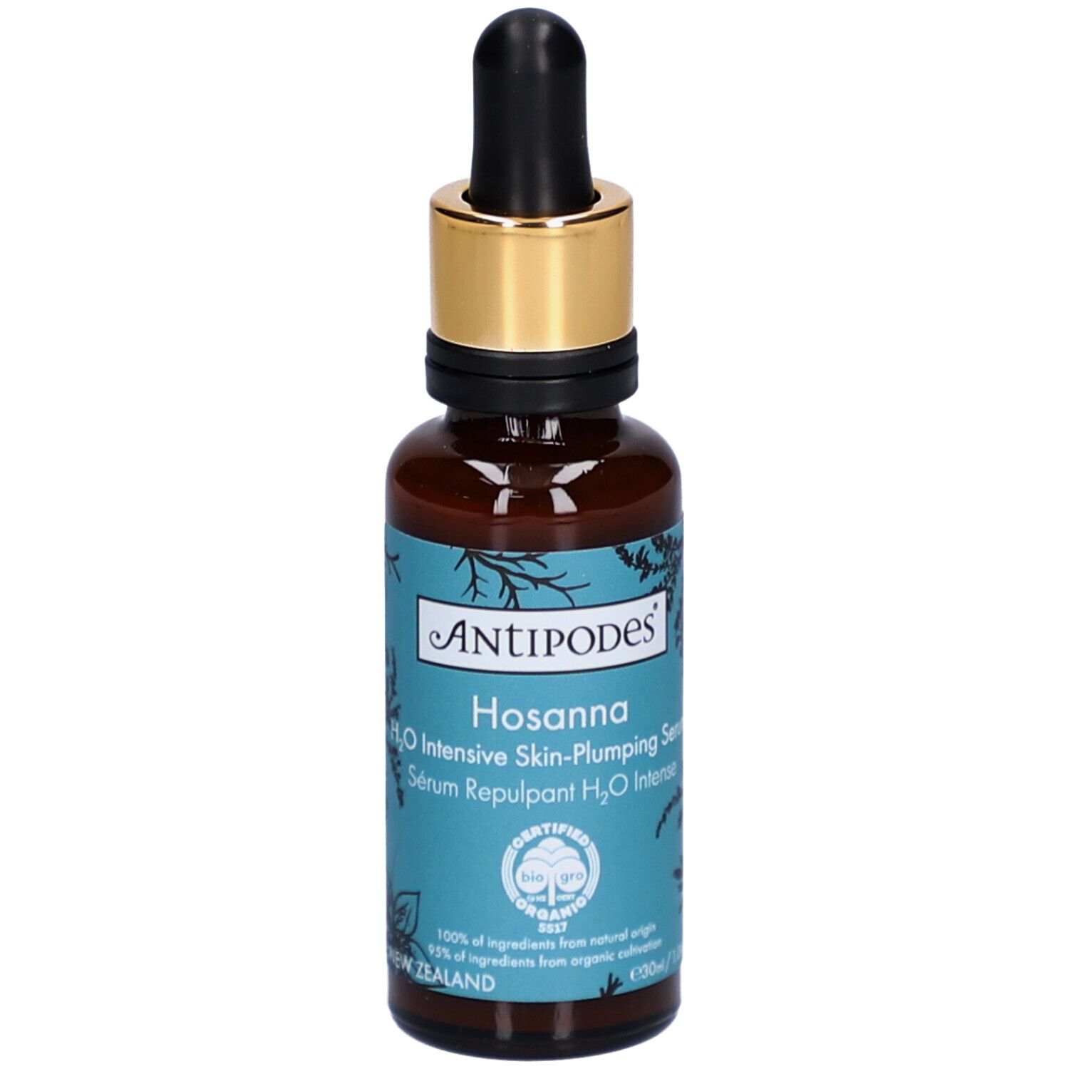 Flacon en verre brun avec bouchon doré et pipette. Inscription: Antipodes Hosanna Serum. Produit bio certifié.
